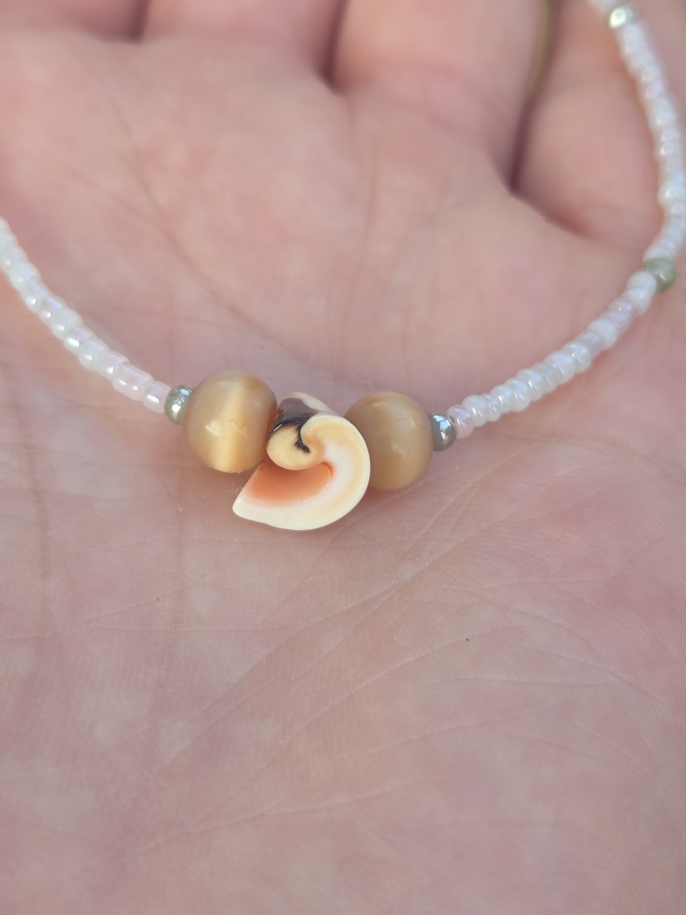 Pink Beaded Bracelet with Peach Shell Centerpiece
